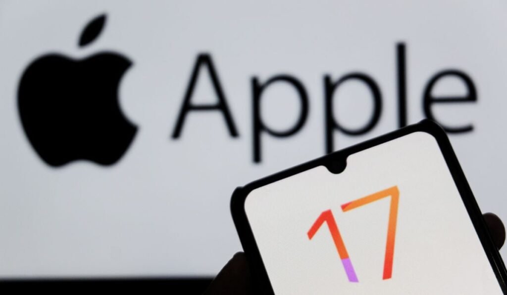 Cum să urmărești lansarea iPhone 17, transmisă în direct de la Apple Park din Cupertino, California Un logo colorat al cifrei 17, pe display-ul unui telefon, in fata unui fundal pe care e afșiat logo-ul Apple.