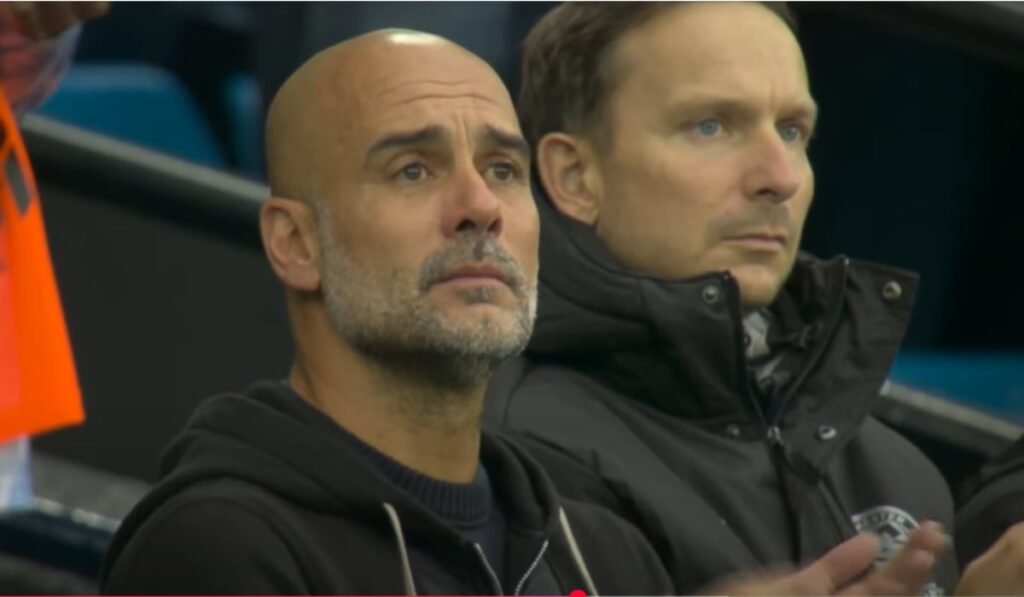 Pep Guardiola îmbrăcat în negru, cu lacrimi în ochi