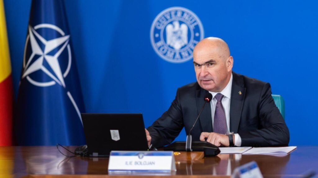 După ce i-a sărăcit pe români, Bolojan se laudă că mănâncă sarmale și cârnați de Crăciun